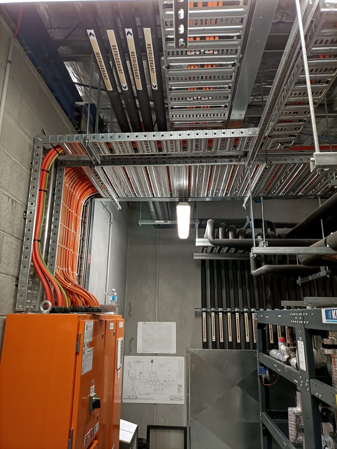Refrigerant lines, cable ladder and field wiring into a switchboard in an ACE Electrics refrigeration plant room